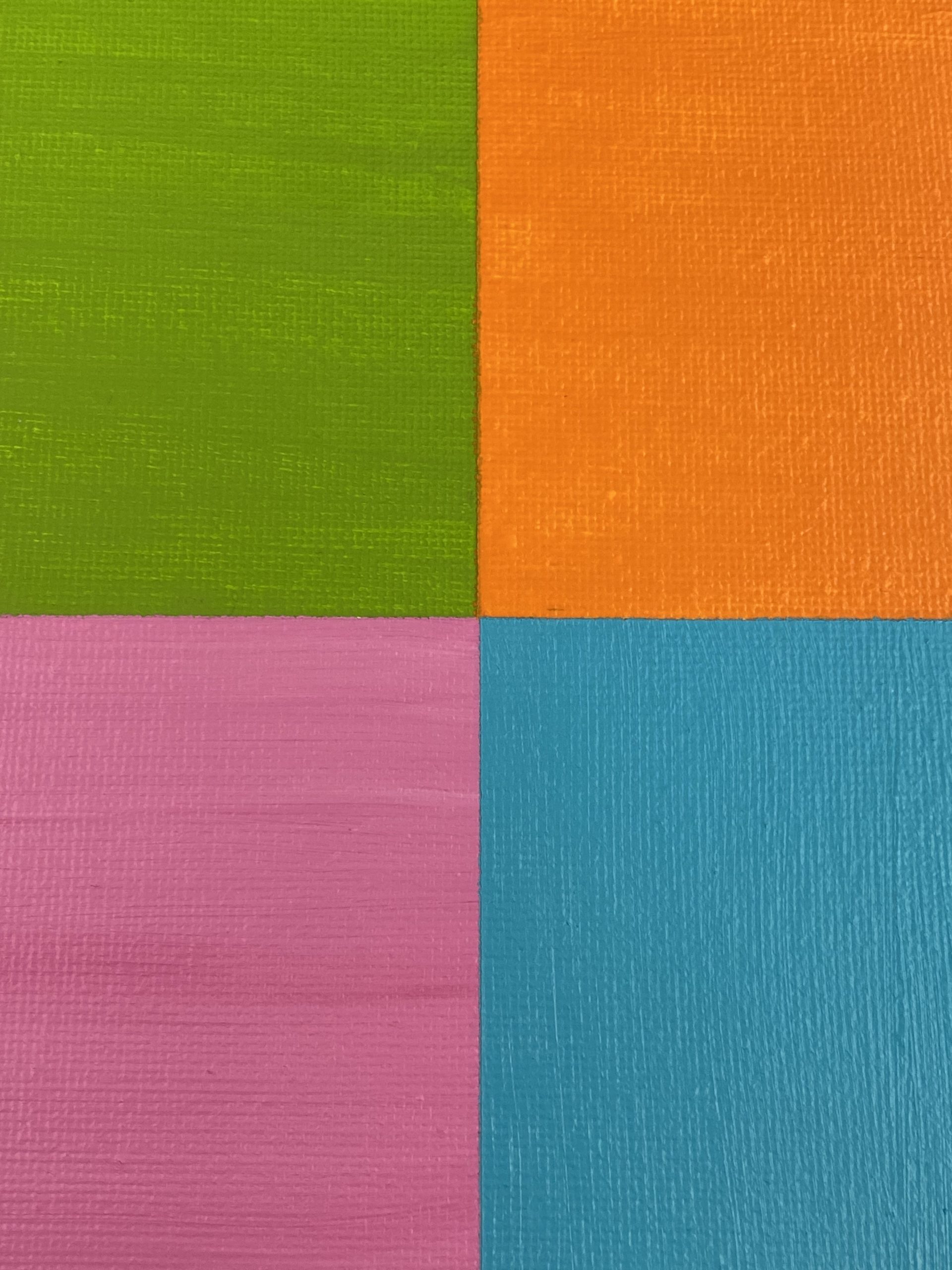 A rectangular canvas divided into four sections: the top left painted green, the bottom left painted pink, the top right painted orange, the bottom right painted blue.