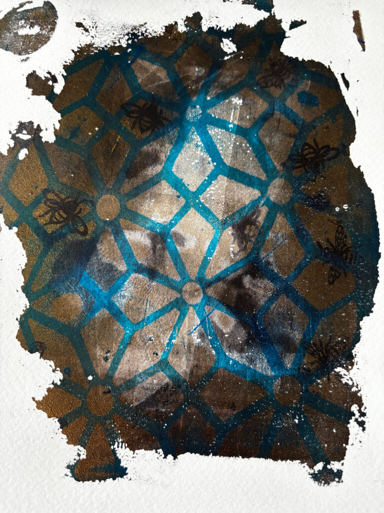 Light gold on black with phthalo blue and clear Hampton Court Palace trellising patterning on a white background.