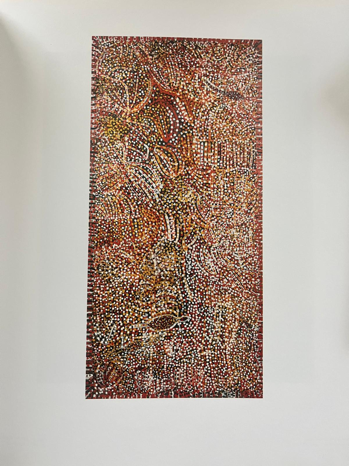 A rectangular painting hung a portrait on a white wall. The painting has an orange background and is covered in white, yellow orange dots in lines and curves. Some are on painted lines and all the dots are around the same size.