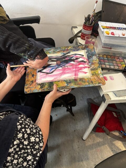 William's artwork in strong pink, blue and black strokes