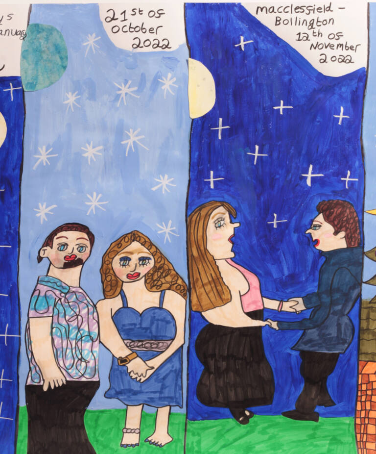 Two sections of a colourful illustrated painting, each depicting a couple. On the left, a couple stands together on green grass beneath a pale blue sky with white stars and a turquoise moon. One person wears a patterned shirt, while the other wears a blue dress. Handwritten text above reads “21st of October 2022.” On the right, a couple faces each other holding hands, with one wearing a pink top and black skirt and the other a dark blue jacket and black trousers. Behind them is a deep blue night sky with white stars and a pale yellow moon. Handwritten text above reads “Macclesfield, Bollington, 12th of November 2022.”